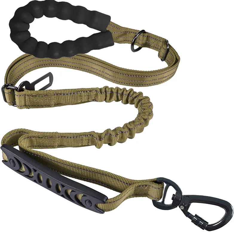 Olive green dog leash with padded handle, bungee section, and carabiner clip for trail walking